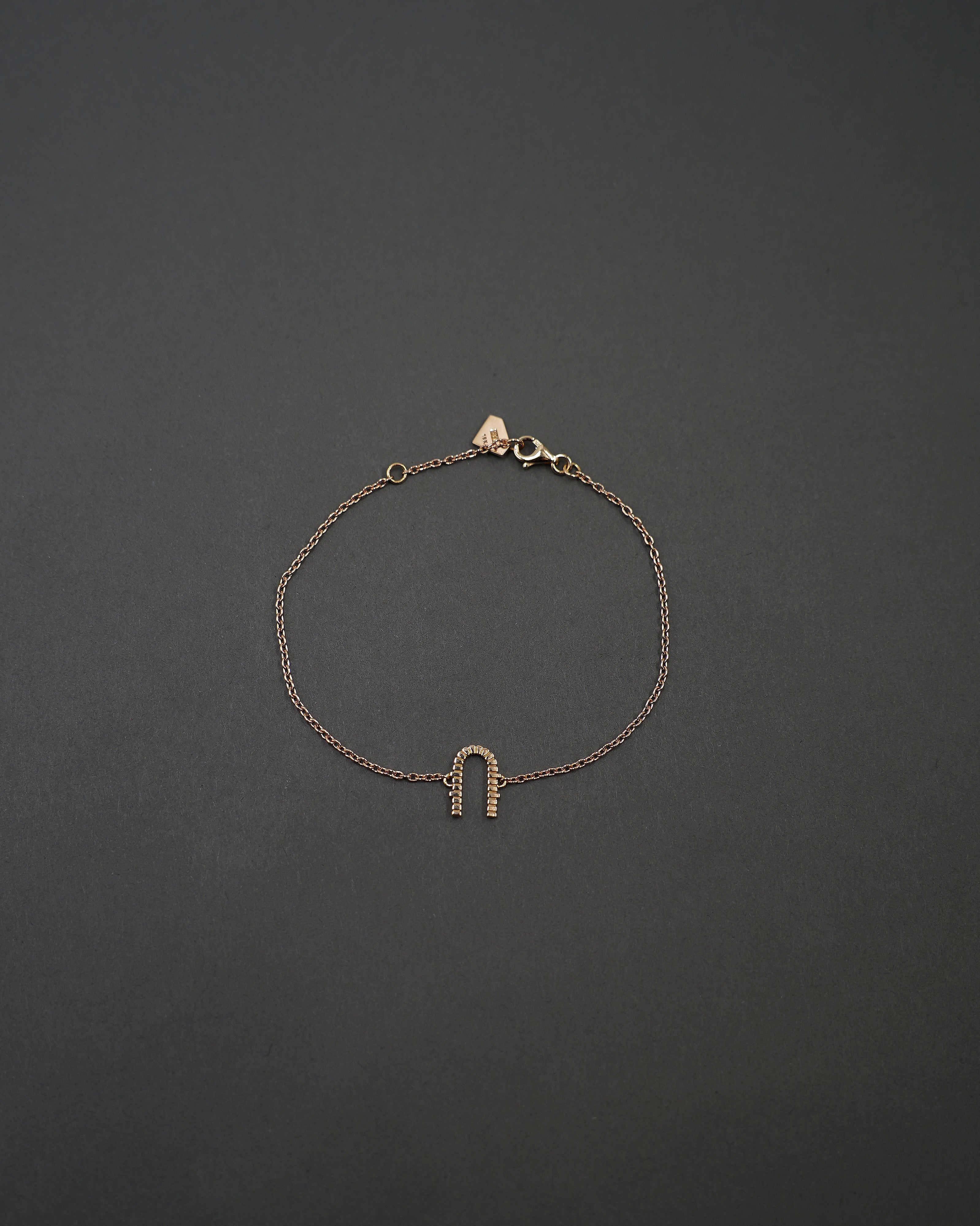KÄRLEKSPORTEN ARMBAND GULD