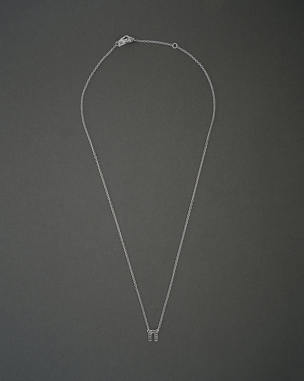 KÄRLEKSPORTEN HALSBAND MINI SVART DIAMANT VITGULD