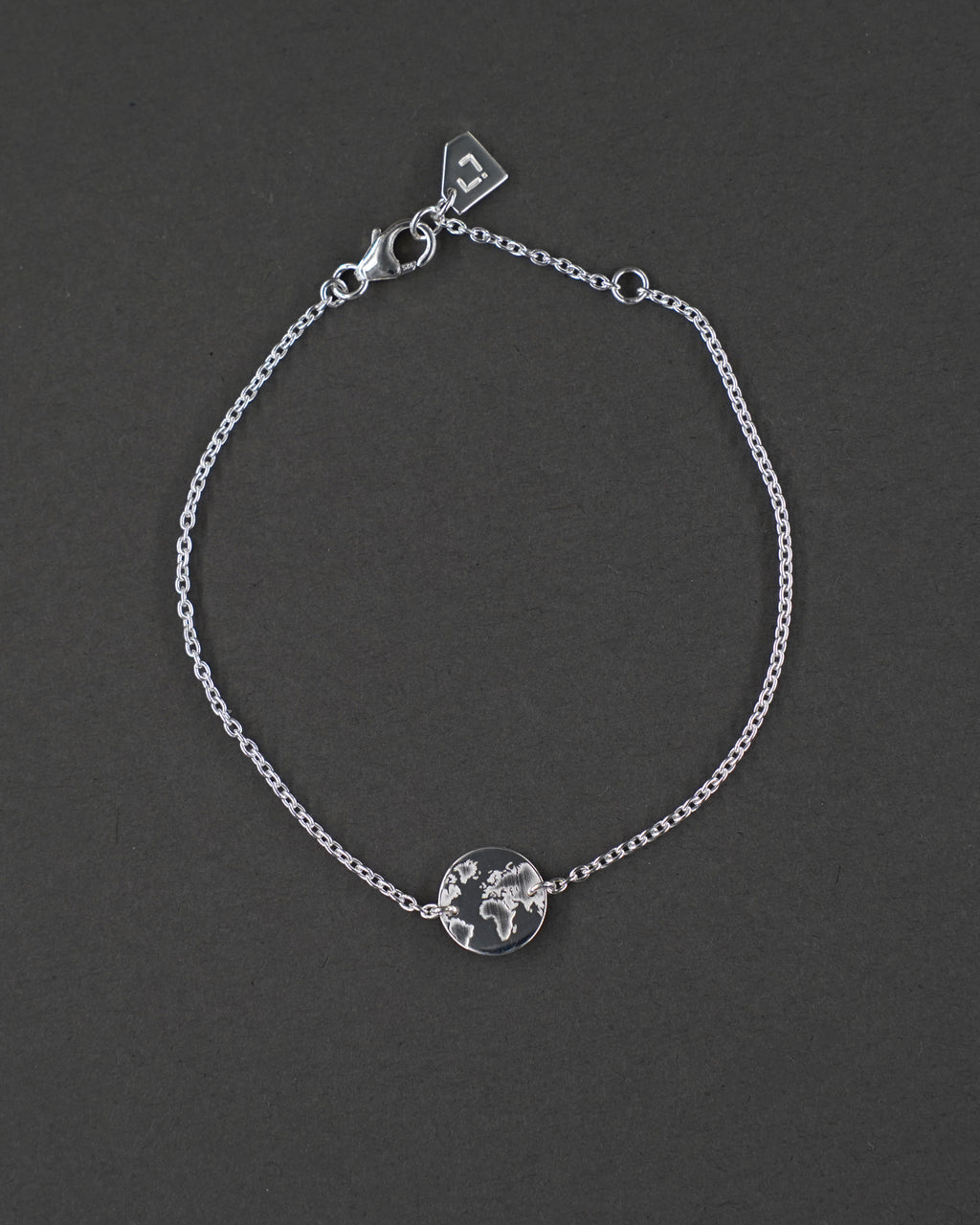 ONE WORLD ARMBAND MINI SILVER