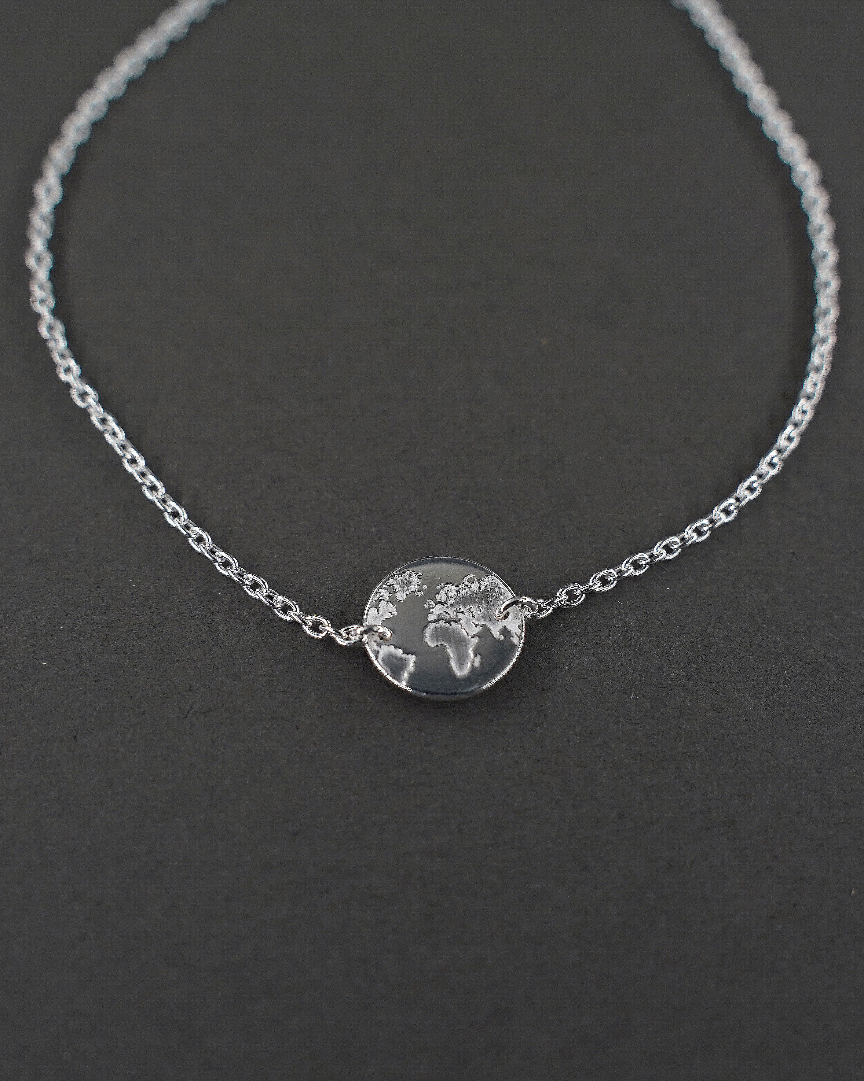 ONE WORLD ARMBAND MINI SILVER