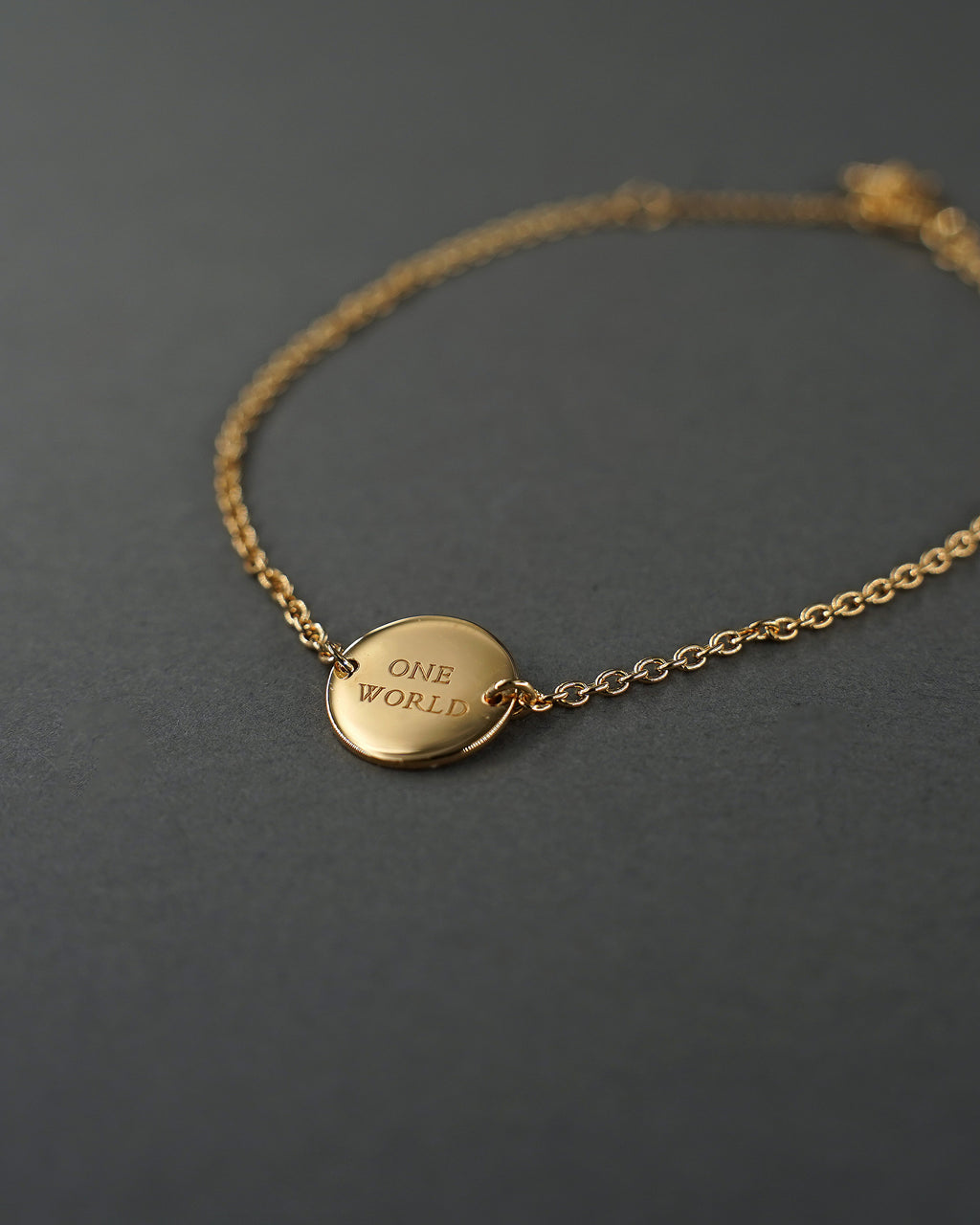 ONE WORLD ARMBAND MINI FÖRGYLLD