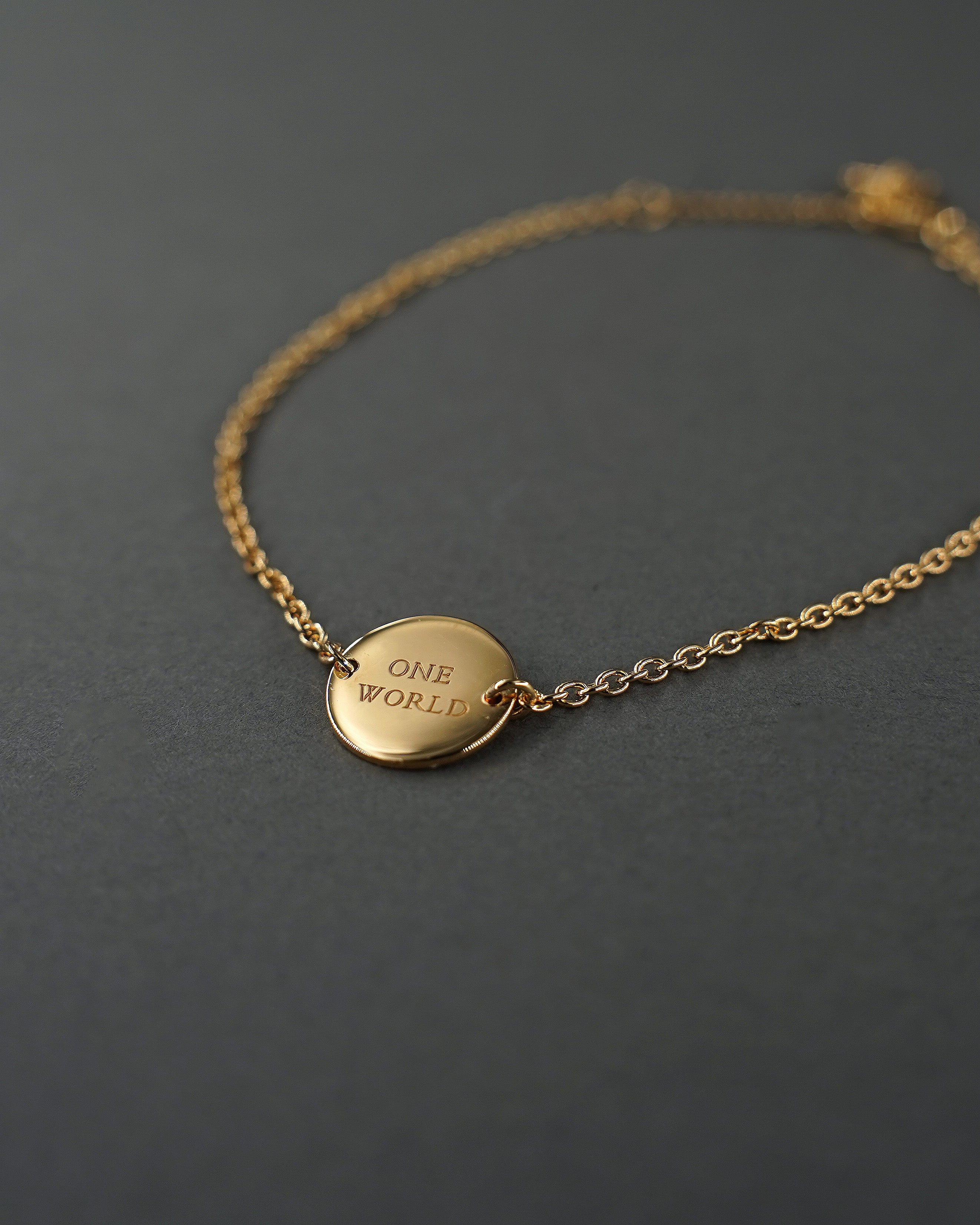 ONE WORLD ARMBAND MINI FÖRGYLLD