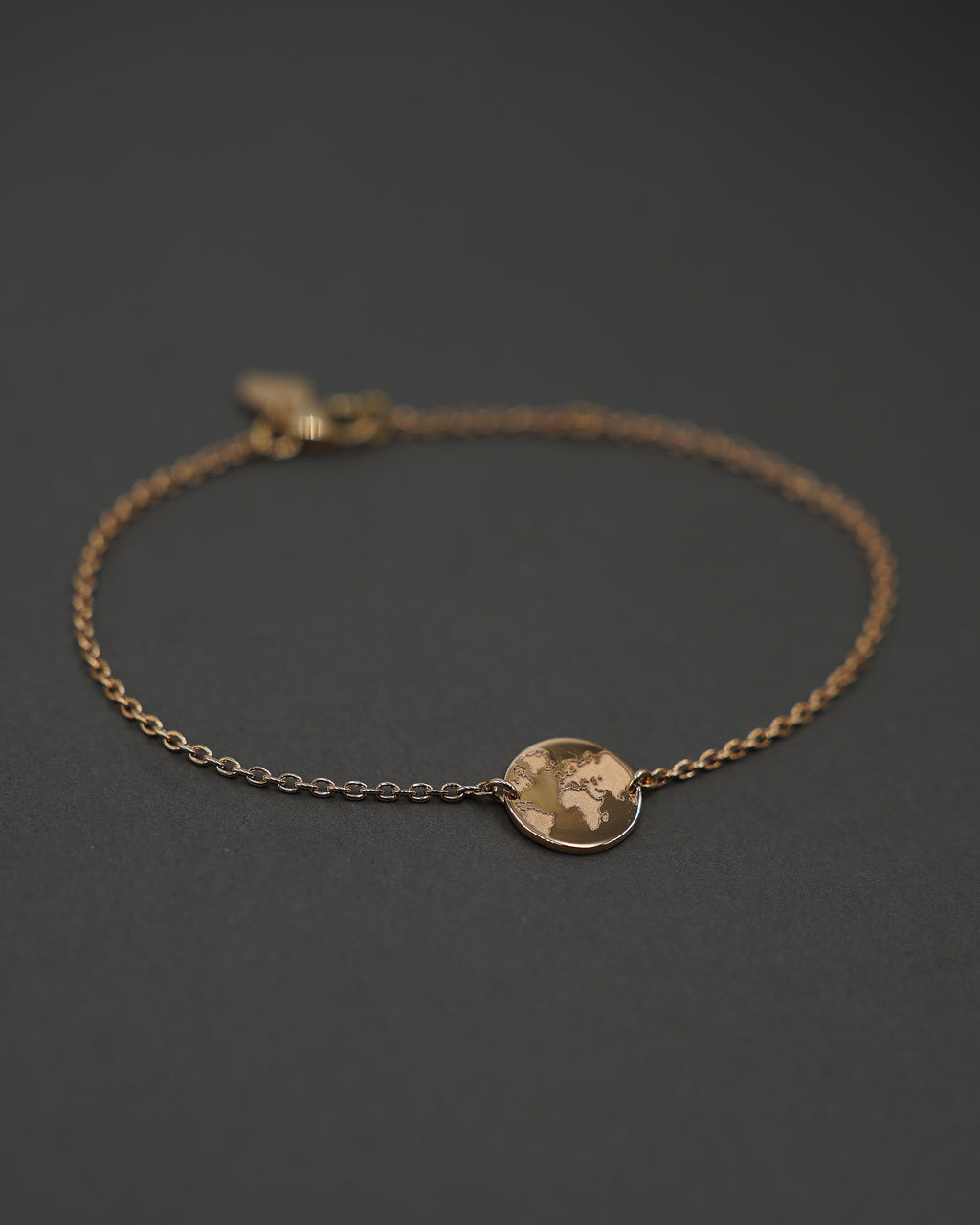 ONE WORLD ARMBAND MINI GULD