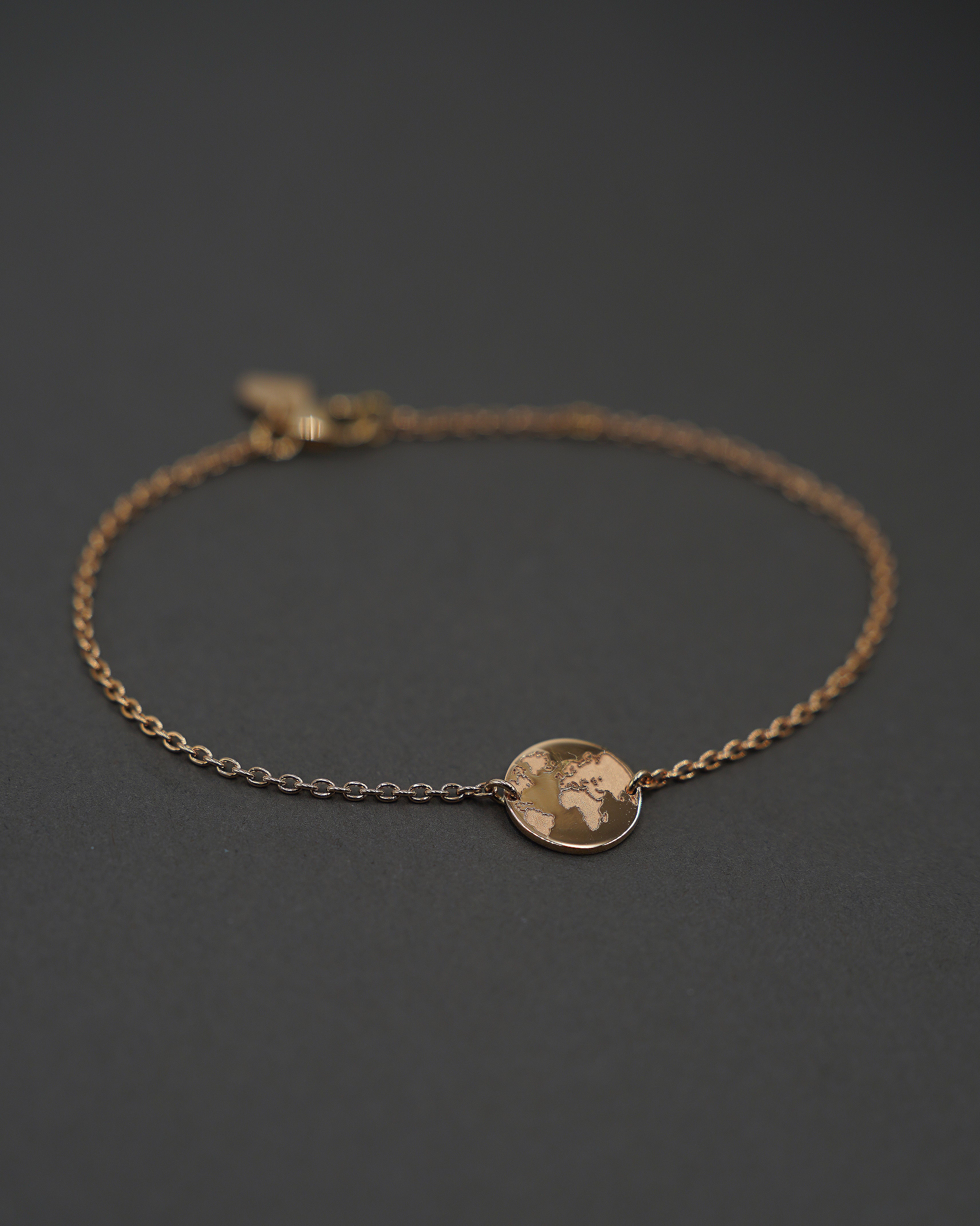 ONE WORLD ARMBAND MINI GULD