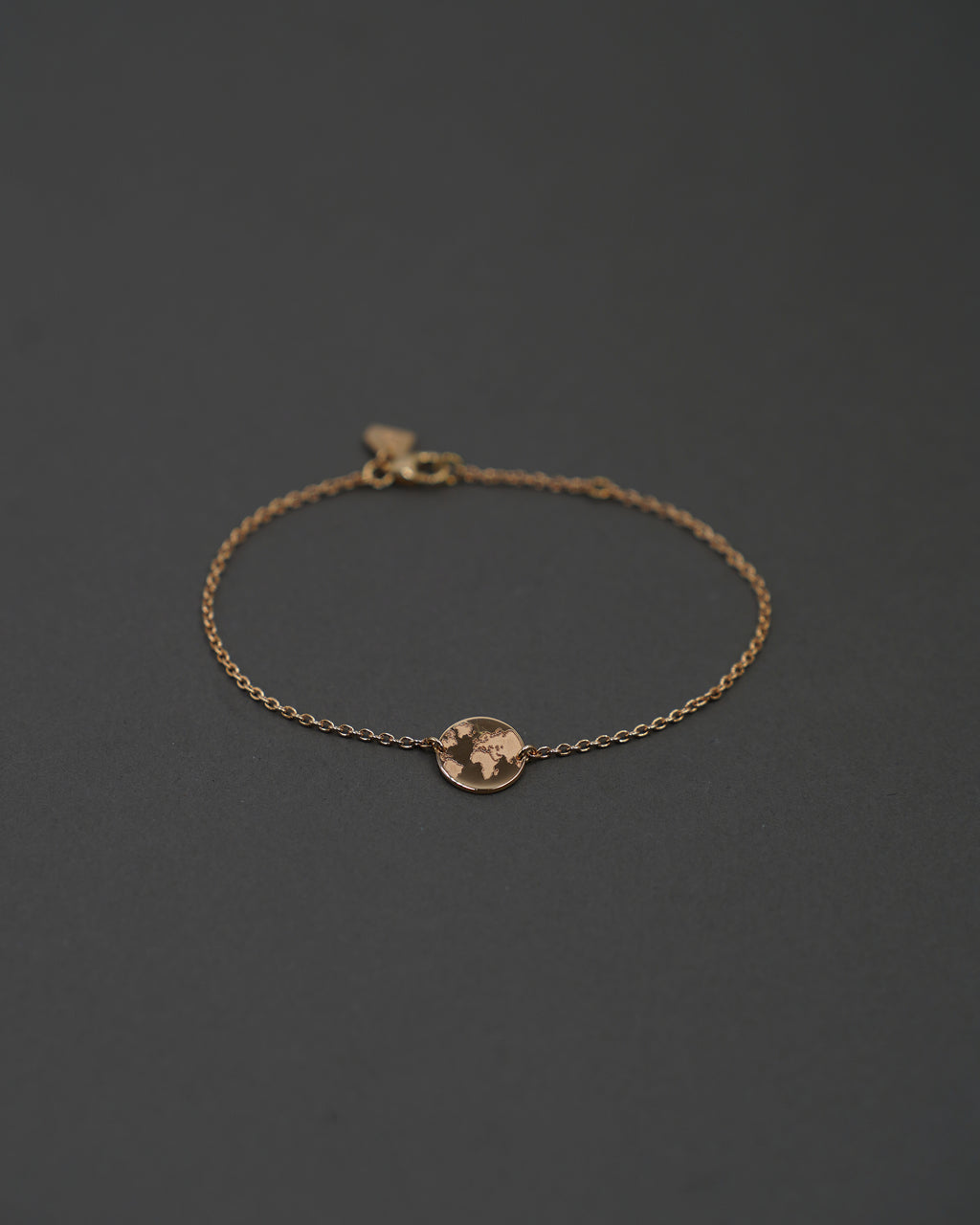 ONE WORLD ARMBAND MINI GULD