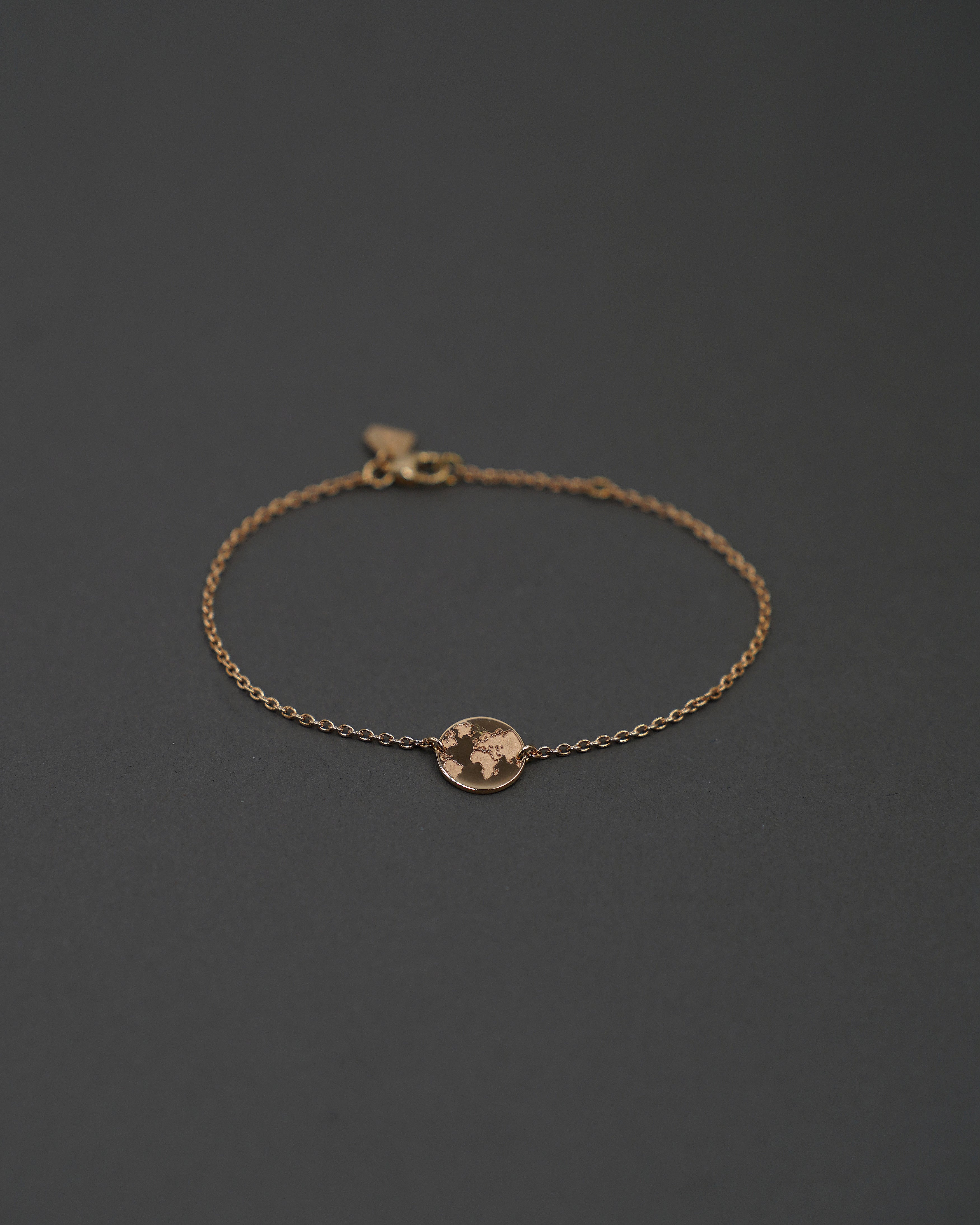 ONE WORLD ARMBAND MINI GULD
