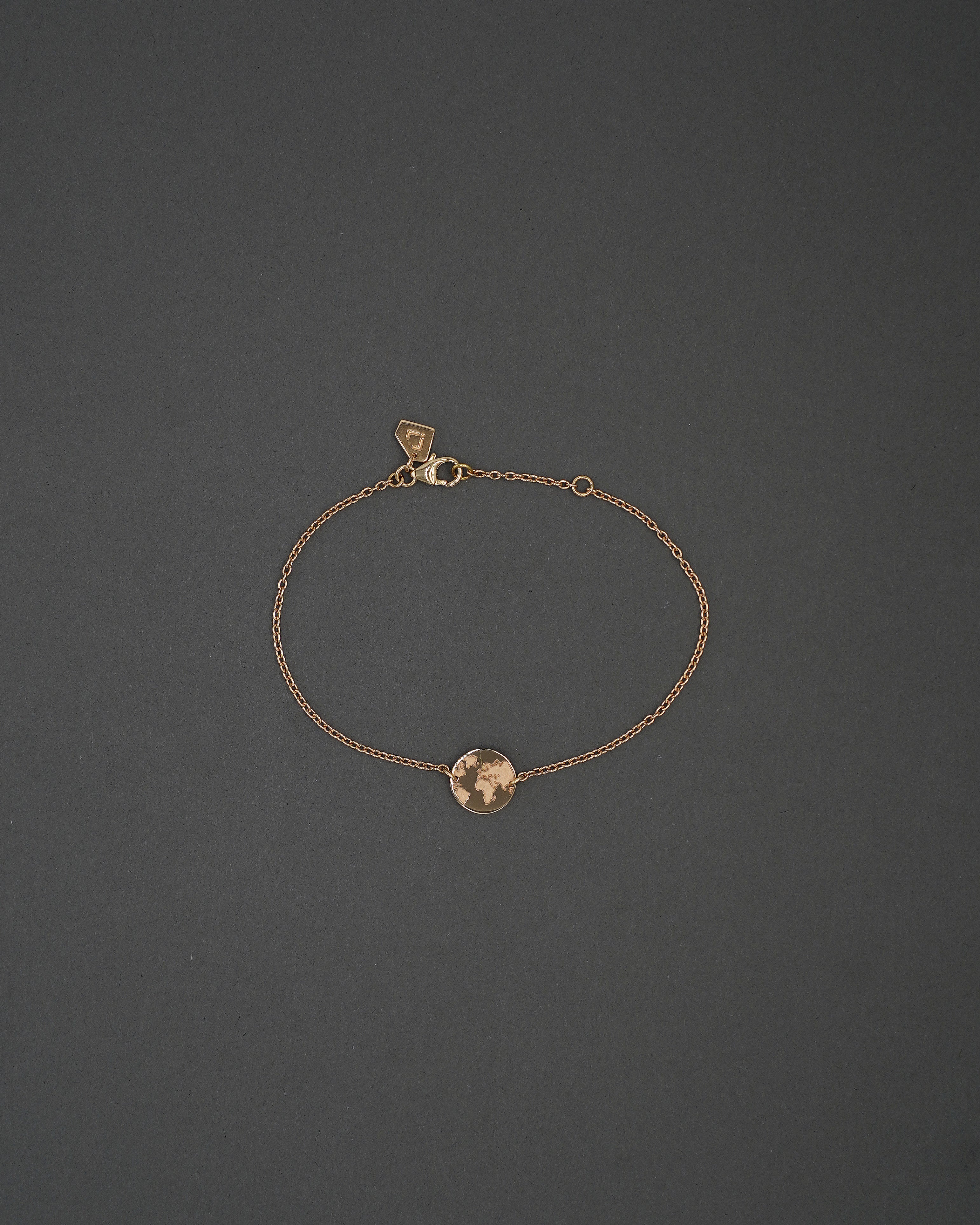 ONE WORLD ARMBAND MINI GULD