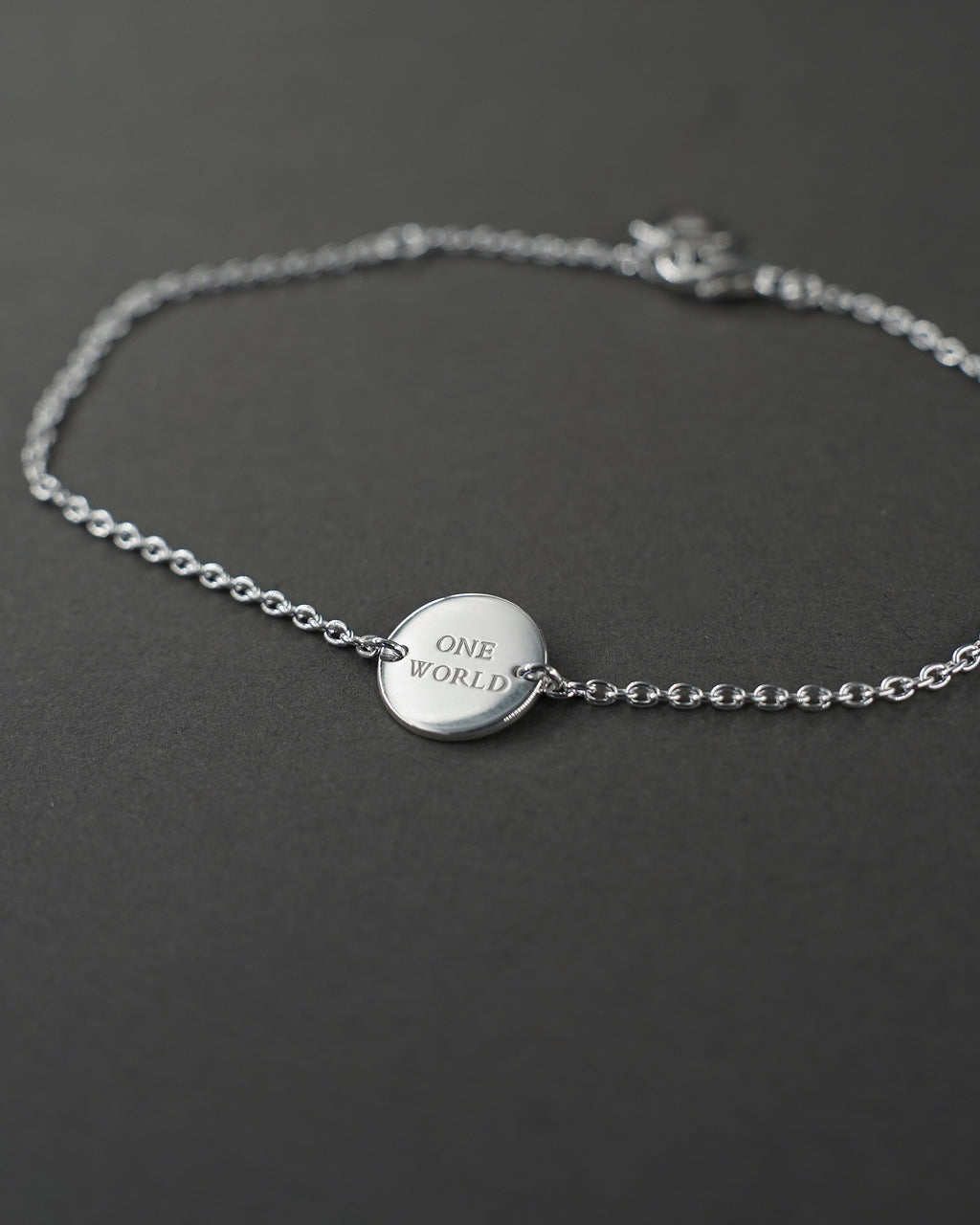 ONE WORLD ARMBAND MINI SILVER