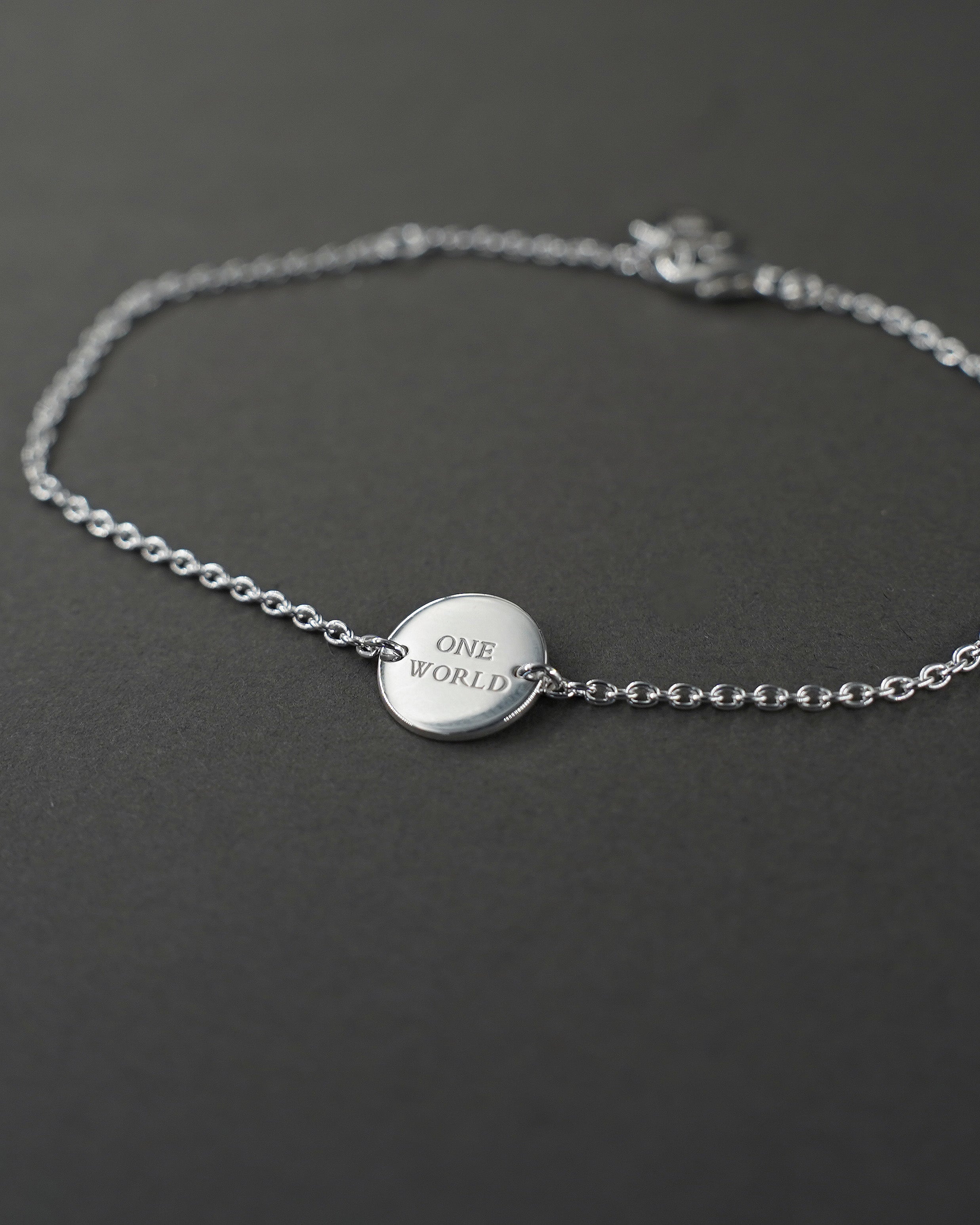 ONE WORLD ARMBAND MINI SILVER