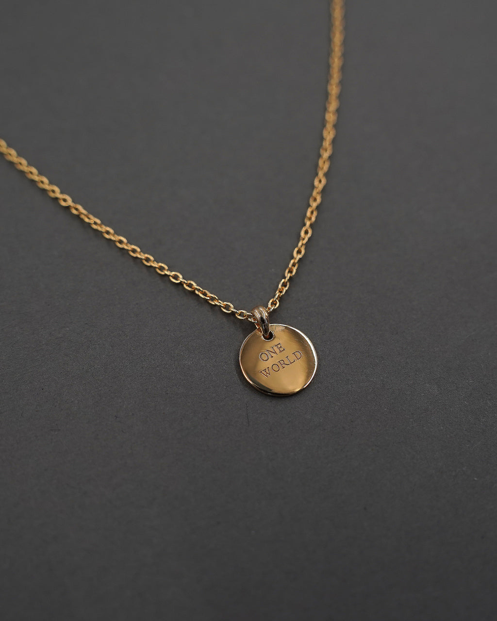 ONE WORLD HALSBAND MINI FÖRGYLLD