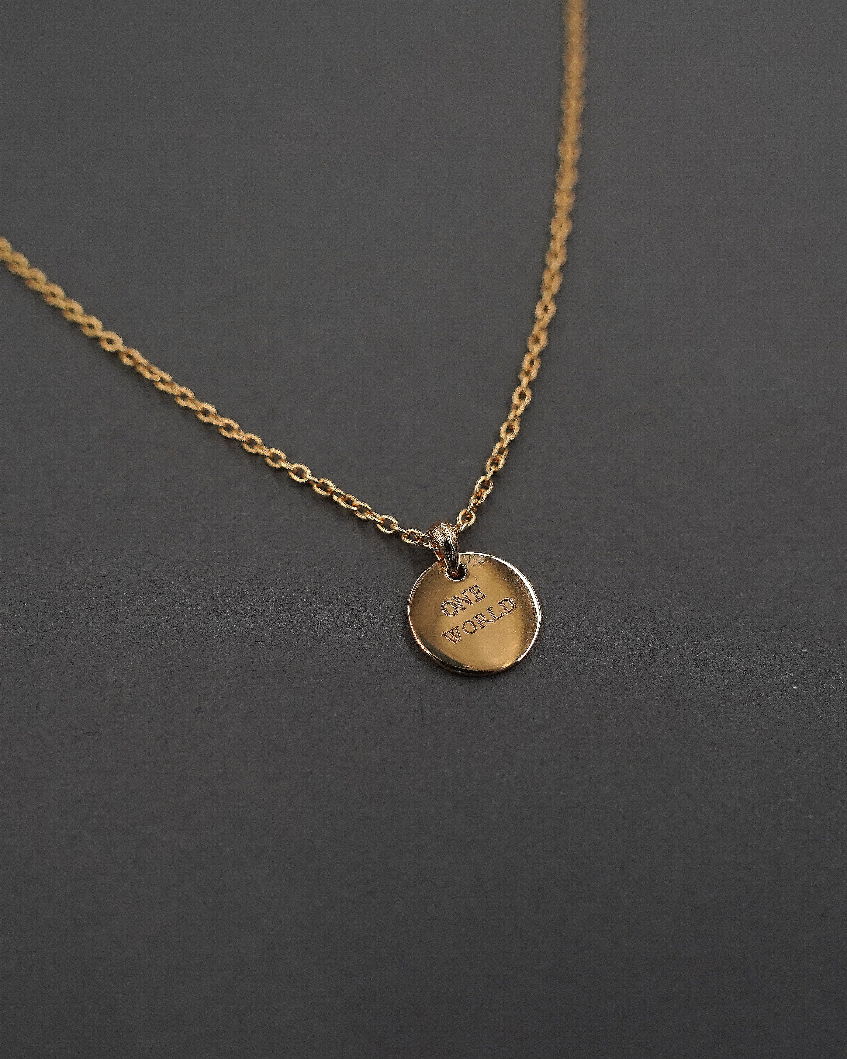 ONE WORLD HALSBAND MINI FÖRGYLLD