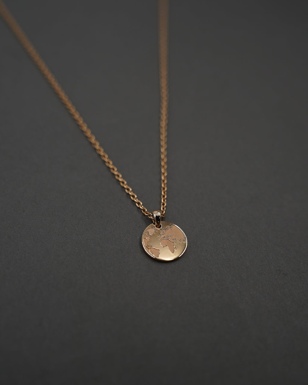 ONE WORLD HALSBAND MINI GULD