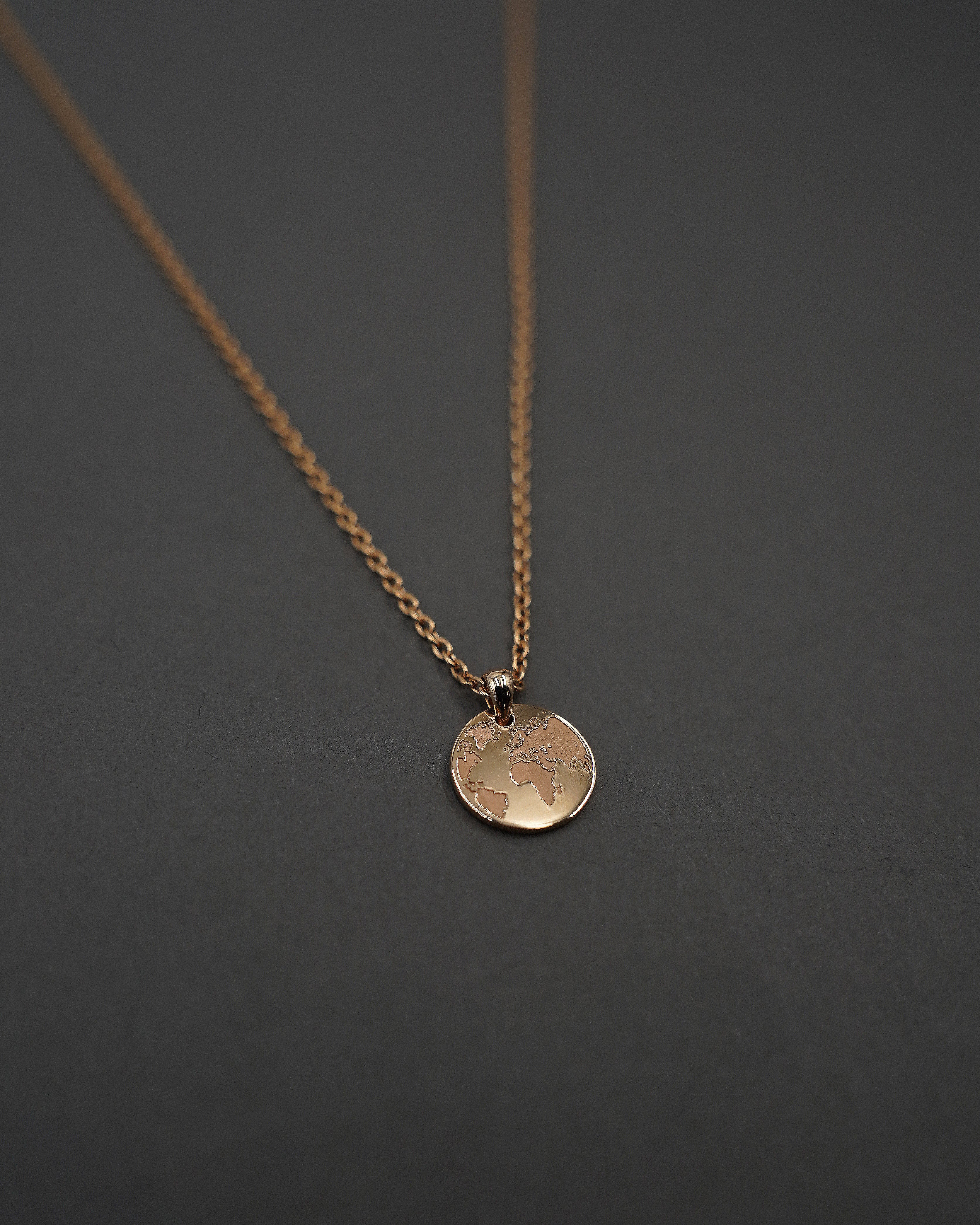 ONE WORLD HALSBAND MINI GULD