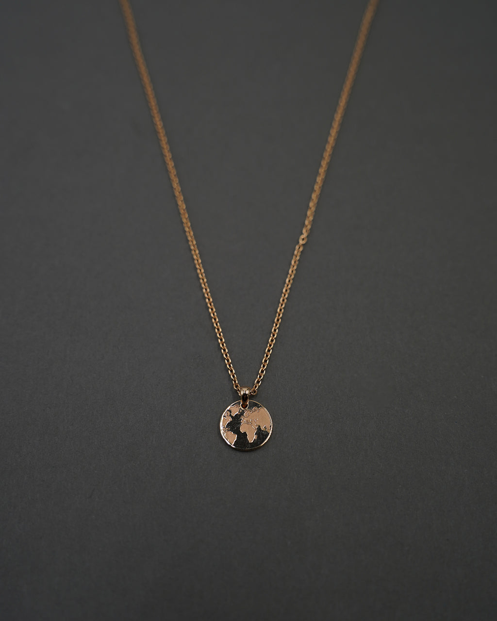 ONE WORLD HALSBAND MINI GULD