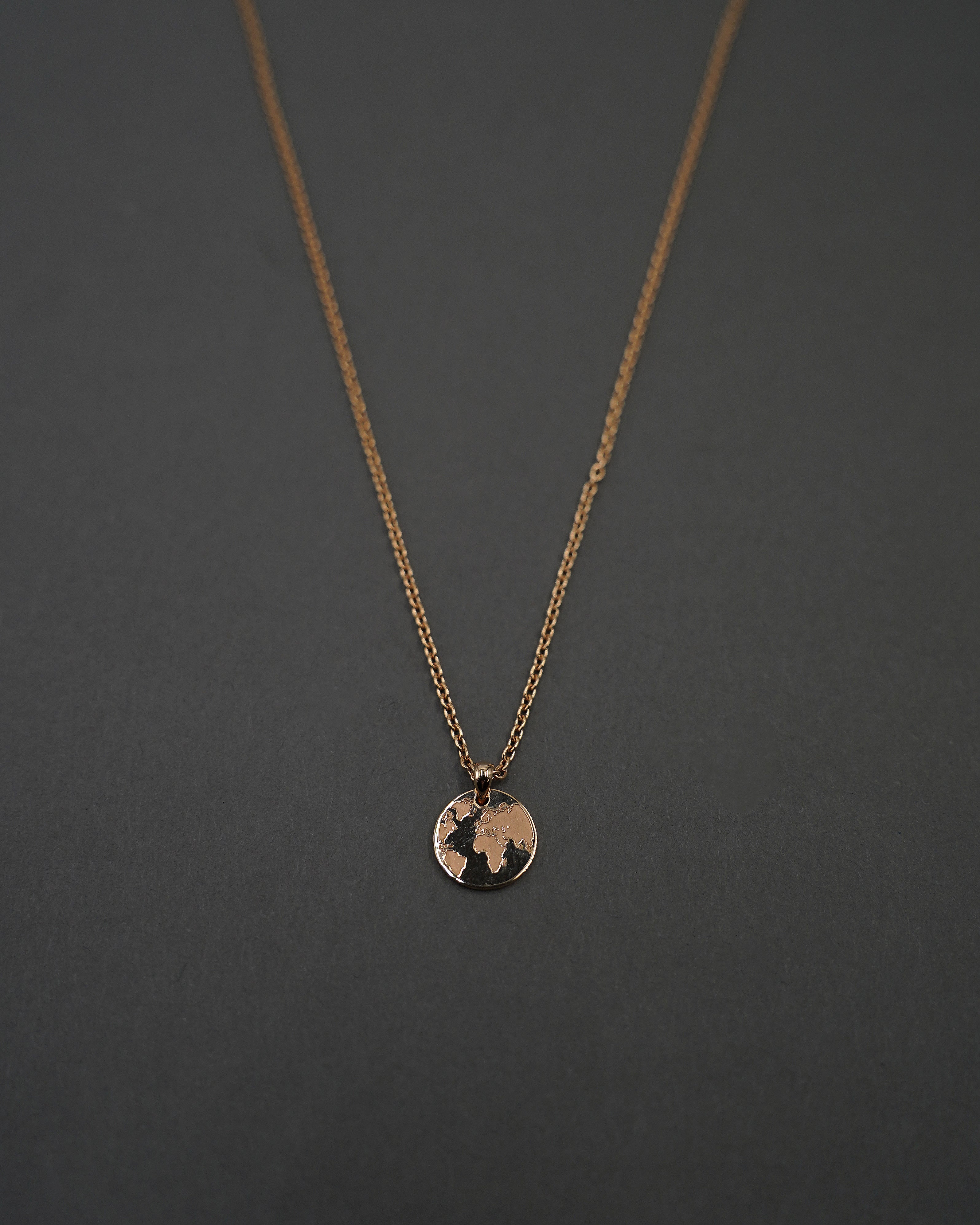 ONE WORLD HALSBAND MINI GULD
