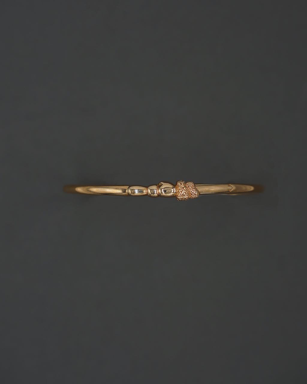 STENKUSTEN ARMBAND CUFF GULD